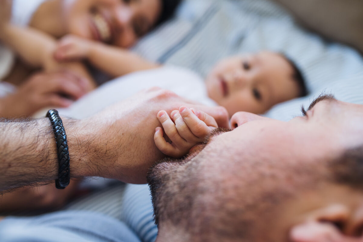 Happy couple smiling together, confident about their family planning journey